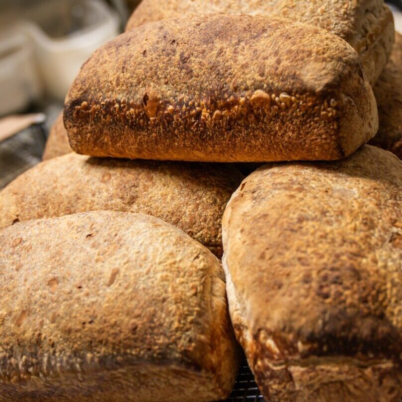 A pile of bread sitting on top of each other.